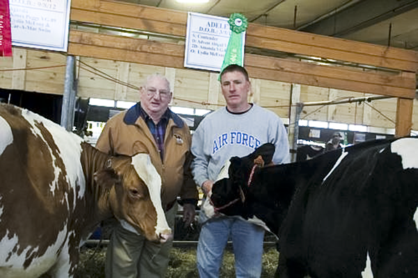 Charlie McEvoy is a standard fixture at many dairy shows. He has been actively exhibiting at every New York Spring Dairy Carousel since its origin. His son, Ken, assisted him at the 2013 show.