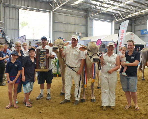 Jeremy Josefski’s family surround the Intermediate and Reserve Intermediate which was exhibited by Tandara Brown Swiss. Photo: Fleur Ferguson.