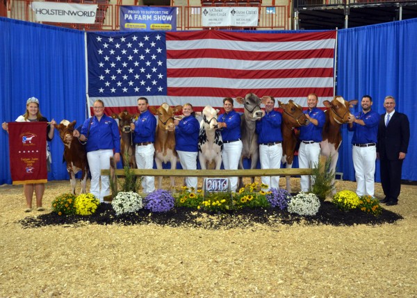 Pappys Doorman Rousey-ET, owned by Jenna Smith and Wade Yardley of Martinsburg, Blair Co., Pa., was named Supreme Champion Heifer during the Supreme Champion pageant held on Thursday, Sept. 22 at the 2016 All-American Dairy Show at the PA Farm Show Complex and Expo Center in Harrisburg. (L-R): PA Second Alternate Dairy Princess Lydia Szymanski, Carrie Ritschard, Kevin Ehrhardt, Nichole Wright, Jen Hill, Jamie Black, Caleb Rossing, Matt Hawbaker, Agriculture Secretary Russell Redding.