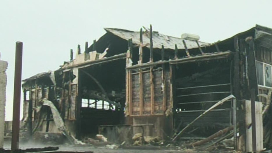 The remnants of a barn on Wellington Road 30 near Guelph, Ont., are seen following an early-morning fire on Monday, Feb. 18, 2013. (CTV Kitchener)