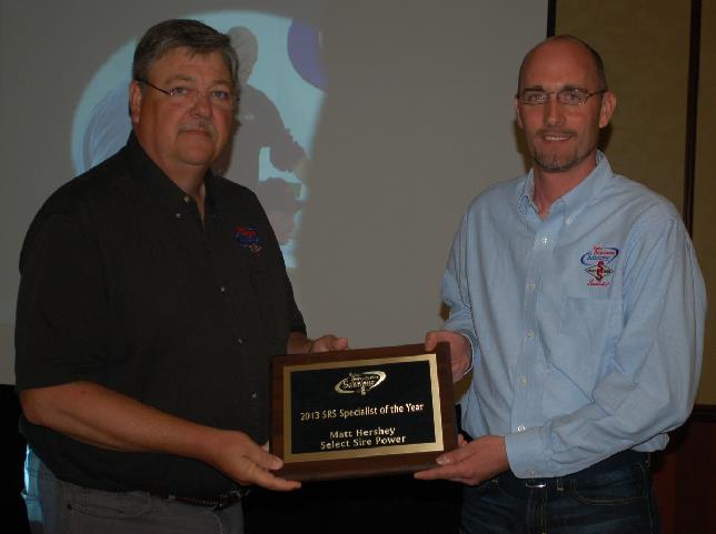 Matt Hershey (right), a SRS specialist with Select Sire Power Inc., was presented with the SRS Specialist of the Year award by Dr. Ray Nebel, vice president of technical service programs, at Select Sires’ 2013 SRS Conference in Columbus, Ohio.
