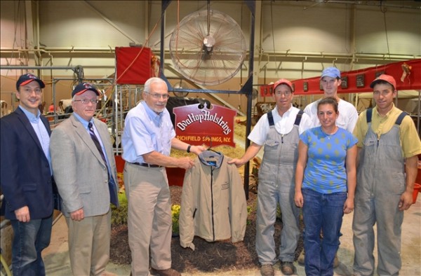 The 1st Place Herdsman Award was given to Ovaltop Holsteins on Wednesday, Sept. 17, at the 2014 All-American Dairy Show at the Pennsylvania Farm Show Complex and Expo Center in Harrisburg. Pictured left to right are Farm Show Complex Show Manager Jim Sharp, Pennsylvania Dairy Industry and Allied Association President Alan McCauley, Retired Farm Show Complex Show Manager Charlie Itle, Doug Wolfe, Amanda Licata. Ben Goodwin, and Mike Wolfe.