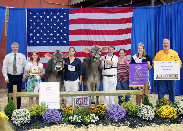 Congratulations to Leslie Bruchey of Westminster, Md., for winning Junior Champion Brown Swiss of the 2016 All American Open Brown Swiss Show, with North Lanes Braiden Present ET, on Sept. 21 at the Farm Show Complex and Expo Center in Harrisburg, Pa. Jeff McKissick of New Castle, Lawrence Co. took home Reserve Junior Champion Brown Swiss honors with Dochaven Braiden Desiree. (L-R): Judge Callum McKiven, Cumberland County Dairy Princess Amy Fogelsanger, Jeff McKissick, Jamie Bruchey, Leslie Bruchey, PA Alternate Dairy Princess Lydia Szymanski, and Don Clark from Liragold.