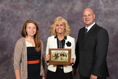 Bonnie Ayars, center, received the American Dairy Science Association's Hoard's Dairyman Youth Development Award in 2015, recognizing more than 40 years spent pulling kids into the dairy industry — the exact work this article is about. Hoard's Dairyman's Amanda Smith and Corey Geiger made the presentation. (Photo: Journal of Dairy Science)